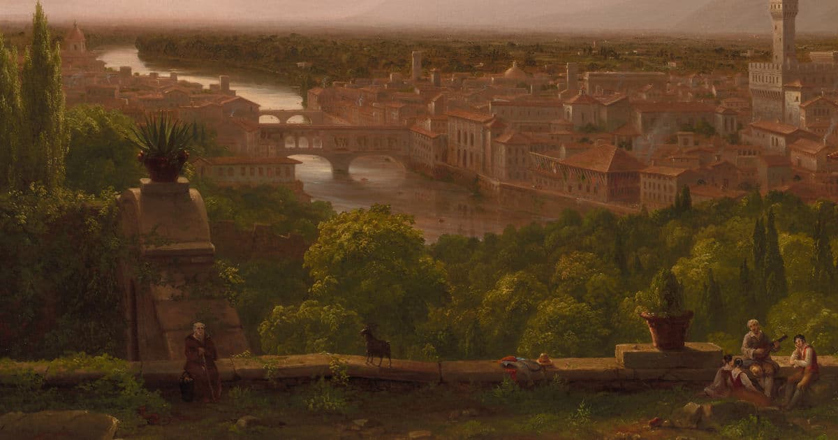 Una città di fiume al tramonto, un chierico riposa mentre alcuni festeggiano.